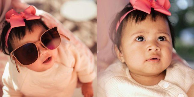 Adorable Portrait of Lily, Daughter of Raffi Ahmad and Nagita Slavina with a Big Bow and Glasses