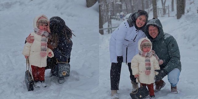 Portrait of Gracia Indri and Gisela Cindy Playing in the Snow in Quebec City