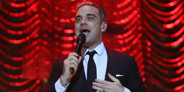 Robbie Williams Tutup Tahun Dengan Catatan Manis