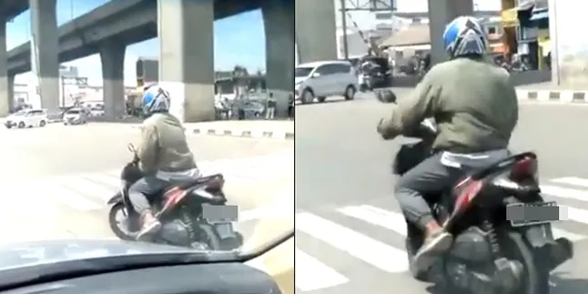 Skill Tingkat Dewa, Pria Ini Tak Mau Turunkan Kaki Dari Motor Saat Lampu Merah