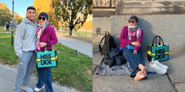 Waiting for Her Child to Run in the Berlin Marathon, Here are 7 Photos of Marini Zumarnis Sitting on the Floor - Her Feet Covered in Plasters