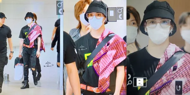 FOTO: Taeyong NCT 127 Tiba di Korea, Pakai Sarung dari Indonesia Jadi Airport Fashion