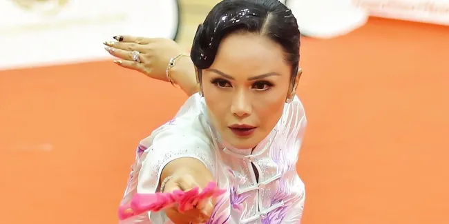 Potret Krisdayanti Raih Medali Emas Wushu di New Kung Fu Singapore 2026