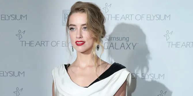 Akankah Amber Heard Jadi Istri Jason Momoa di 'AQUAMAN'?
