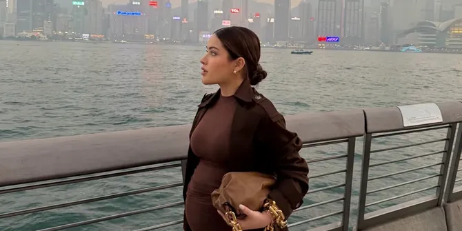 7 Potret Nicole Parham Liburan di Hong Kong, Pamer Baby Bump yang Makin Besar