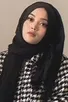 Putri Delina