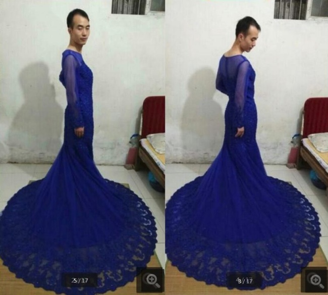 Si pria mencoba gaun yang dijualnya untuk salah satu pelanggannya/copyright odditycentral.com