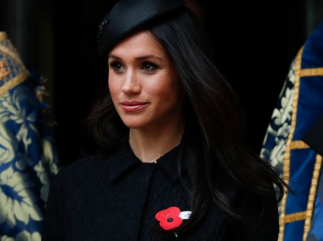 Hampir sama dengan Ratu Elizabeth, kini Meghan kerap memakai topi saat mendatangi acara penting./copyright AFP